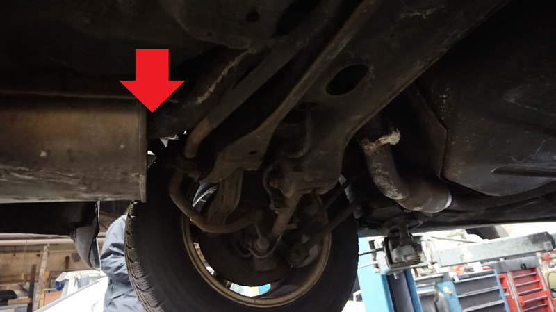 The red arrow indicates where the muffler rusted through. Sadly there’s no better picture available